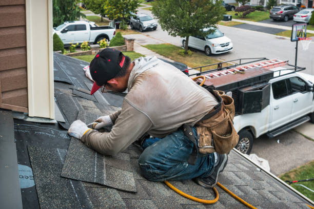 Professional Roofing technician working in Peoria, IL